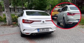 Ayağını camdan çıkararak otomobil kullanan sürücü gözaltında