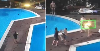 Lüks sitede köpeğine tekme atan yöneticiyi havuza attı